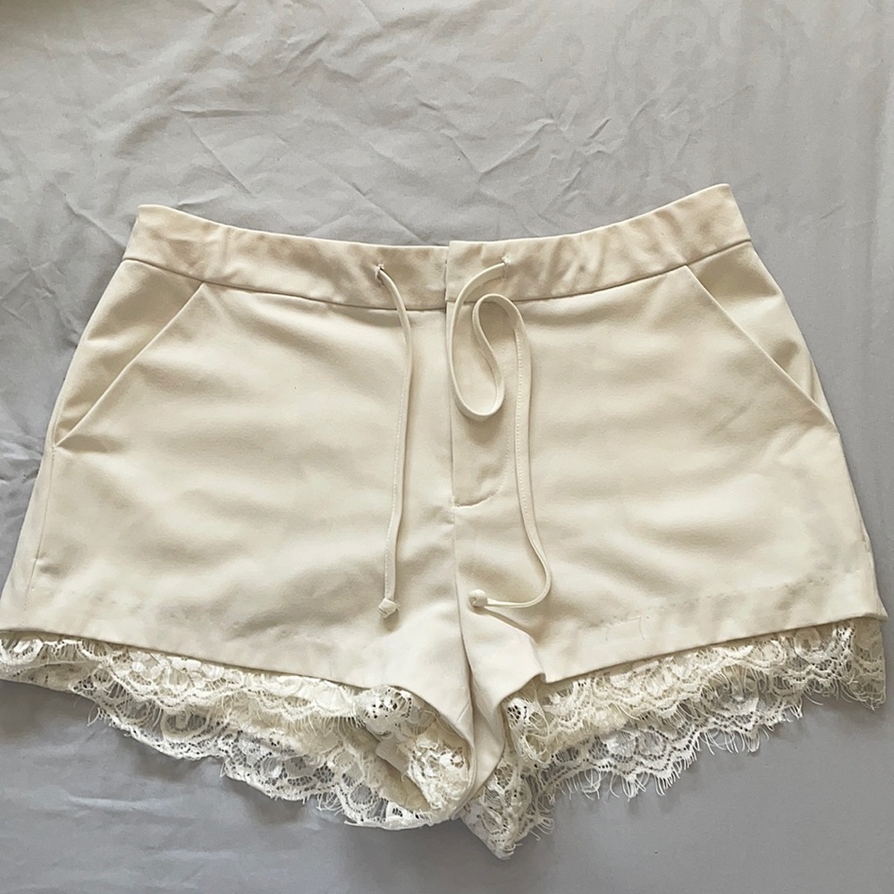 F21 white shorts with detailed lace